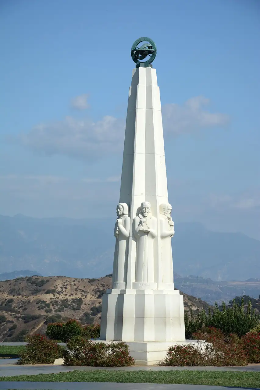 The white Astronomers Monument on the lawn of Griffith Observatory