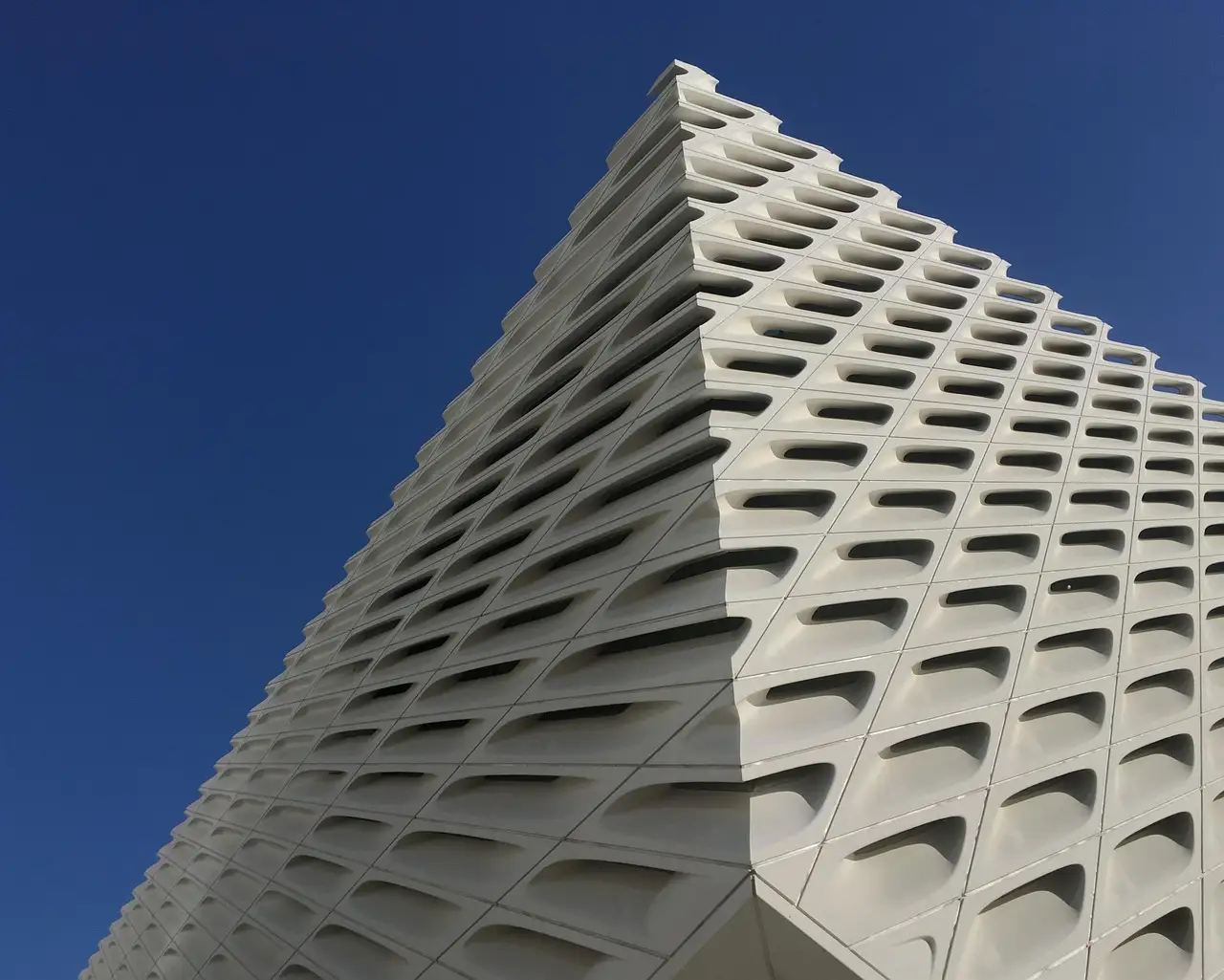 White honeycomb facade of The Broad art museum in downtown Los Angeles
