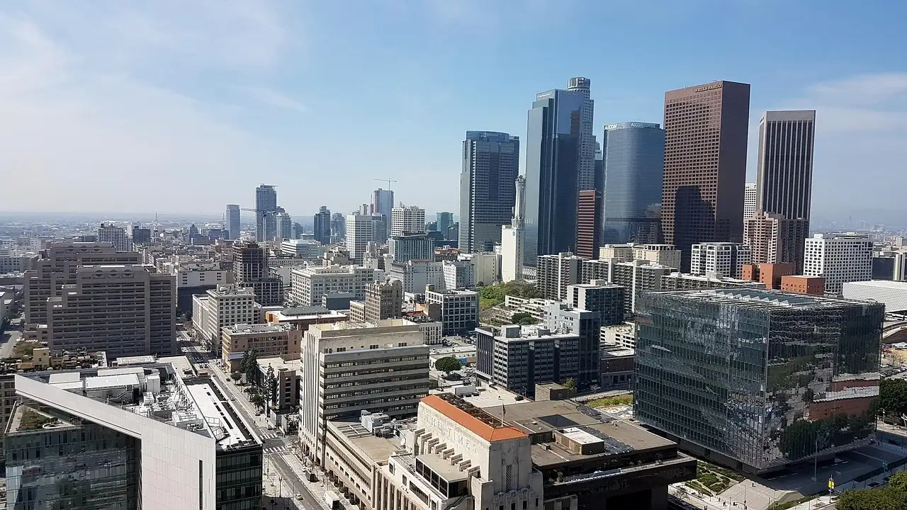 High-rise towers of downtown Los Angeles under a blue sky